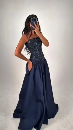 فستان سهرة كحلي كورسيه شك خرز وتنورة ميكادو ملكية