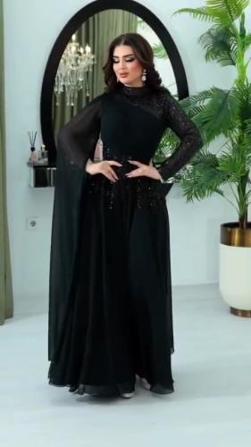 فستان سهرة أسود فاخر بلمسات ترتر وتصميم درابيه عصر...
