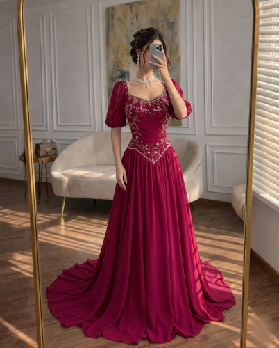 فستان سهرة عنابي شيفون تطريز يدوي وتصميم دبل كلوش