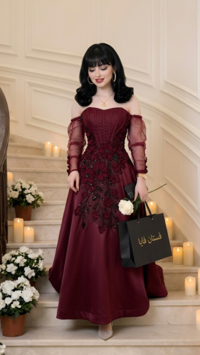 فستان سهرة ليليان ملكي باللون البرغندي مع تطريز يد...