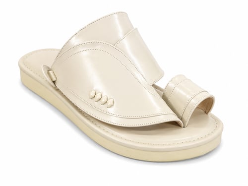 An oriental shoe in beige color