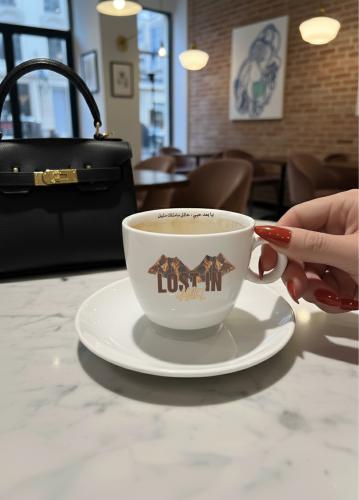 كوب قهوة مطبوع حائل