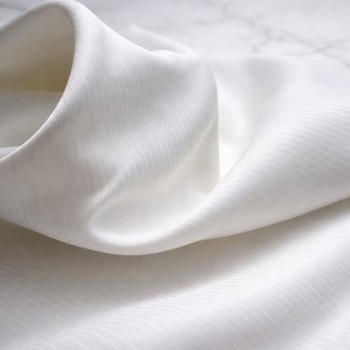 قماش كهرمان مقلم بلس