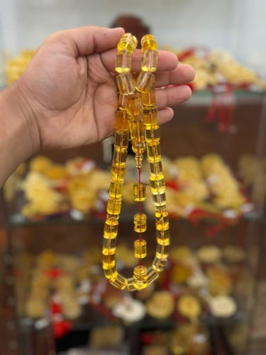 سبحة كهرمان طبيعي شفاف