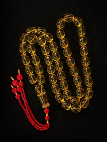 سبحة كهرمان طبيعي شفاف