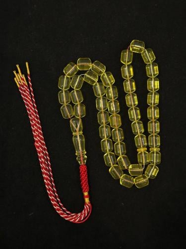 سبحة كهرمان طبيعي شفاف