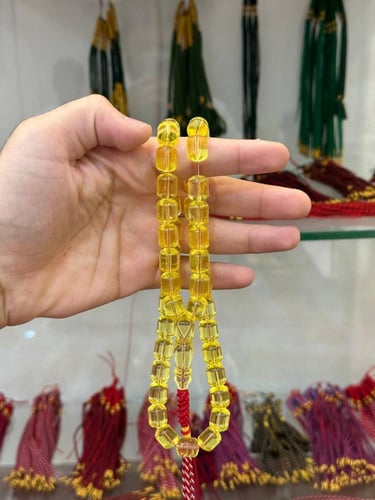 سبحة كهرمان طبيعي شفاف