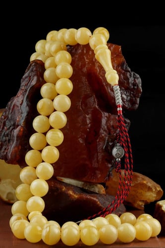 سبحة كهرمان طبيعي لوقو