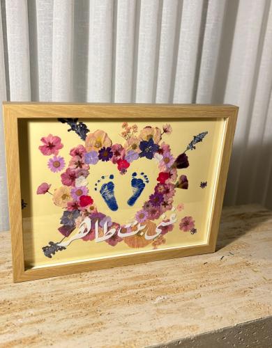 برواز بصمة قدم مولود