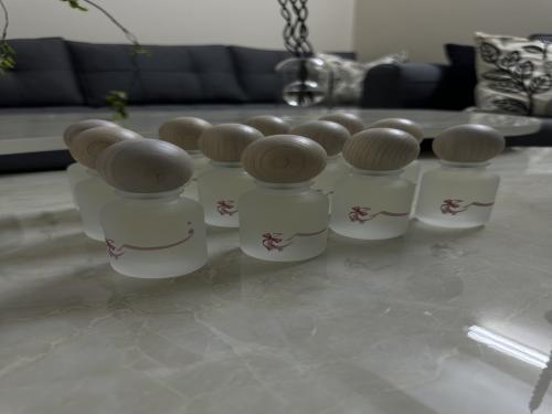 A dozen perfumes with printing