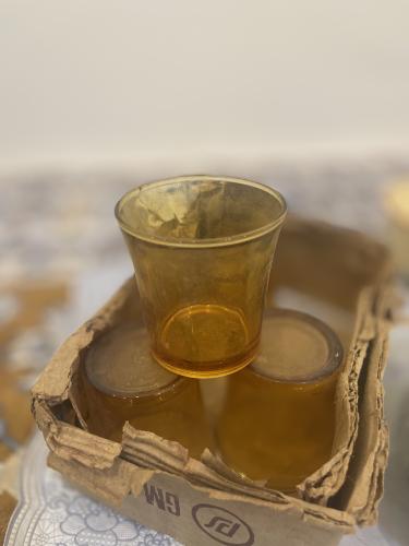 One honey-colored cup