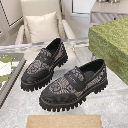 حذاء ماركة ‏Gucci