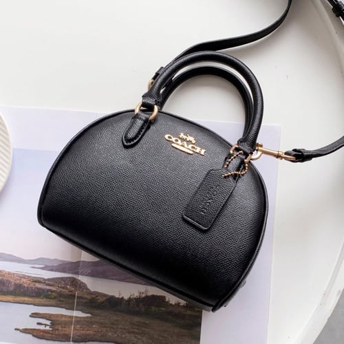 شنطة نسائية ماركة Coach