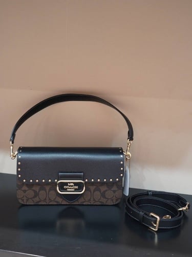 شنطة نسائية ماركة Coach