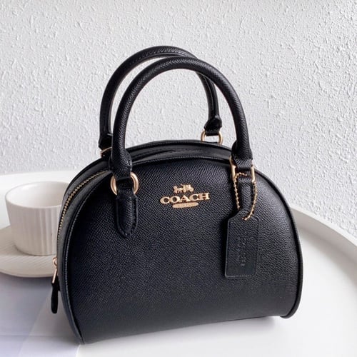 شنطة نسائية ماركة Coach