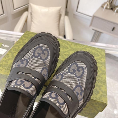 حذاء ماركة ‏Gucci