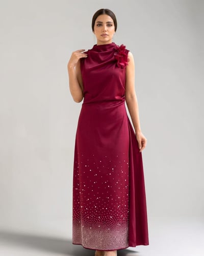 Dress decorated with a brooch, flower, red color
