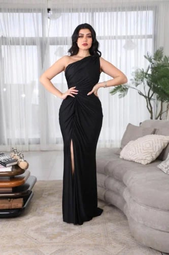 Black evening dress with a waist-cut design