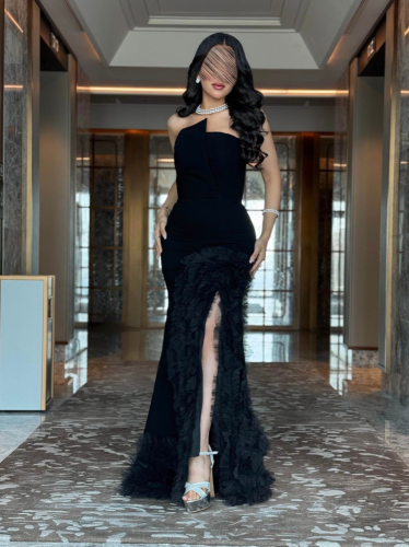 Black royal dress with a train cut