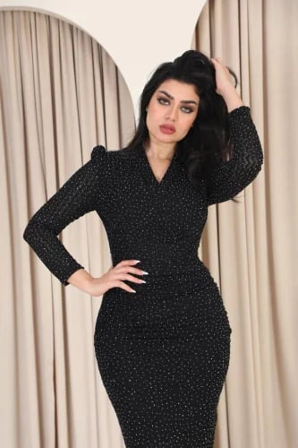 Elegant evening dress with stones and long sleeves