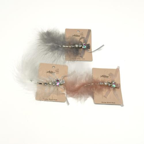 كلبس مشبك شعر بناتي تصميم الريشة