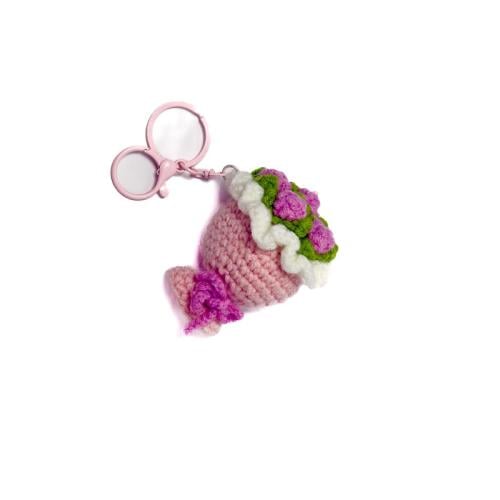 تعليقة البوكيه الوردي ميدالية من التريكو