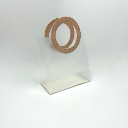 كيس هدايا فاخر شفافة بمسكة جلد دائري لون وردي مقاس...