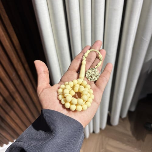 مسباح بيج شبيه العاج مصفر