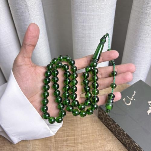 مسباح تمليكه أخضر شفاف