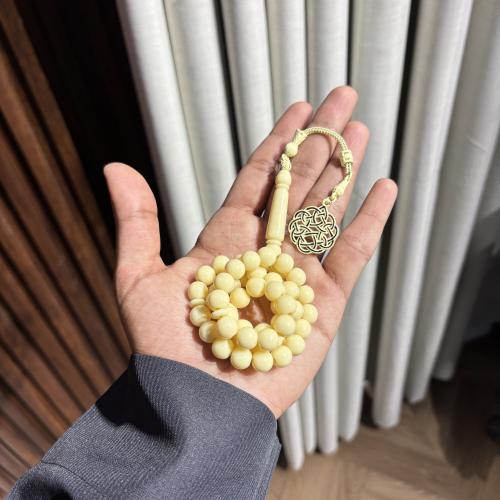 مسباح بيج شبيه العاج مصفر