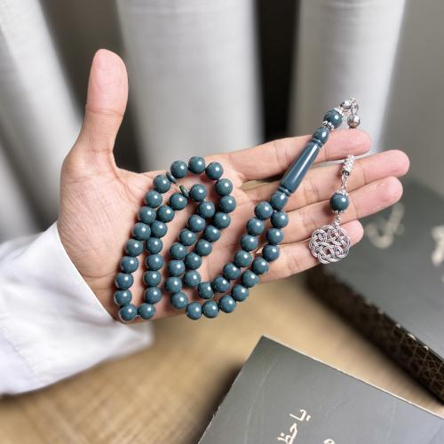 مسباح بكلايت أسماني مائل على الخضار