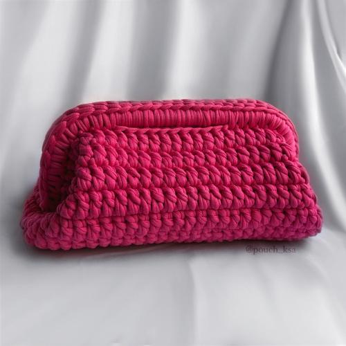 شنطة كلاتش باللون فوشي غامق