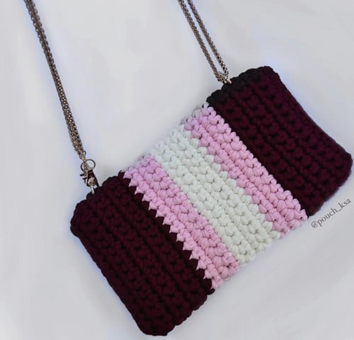 شنطة ميني باوتش بتدرجات اللون الأحمر