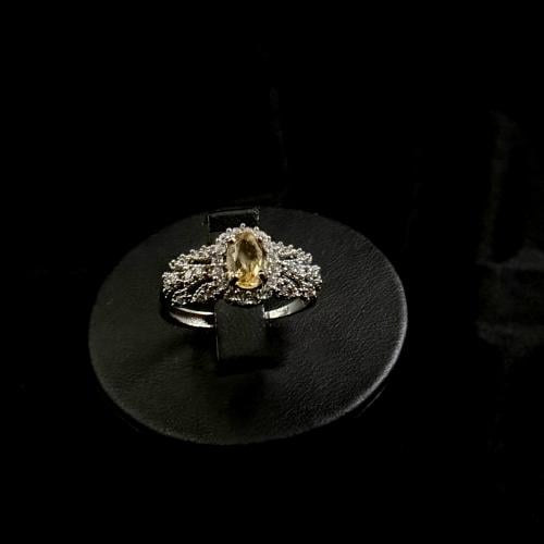 You will see a natural cover decorated with zircon..925 silver..size (adjustable from the bottom)