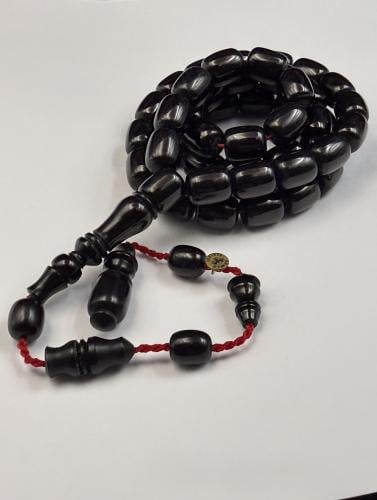 Black invoice box-shaped.. Ahmed Al Ali turning.. (45) bead.. bead size (12*10)