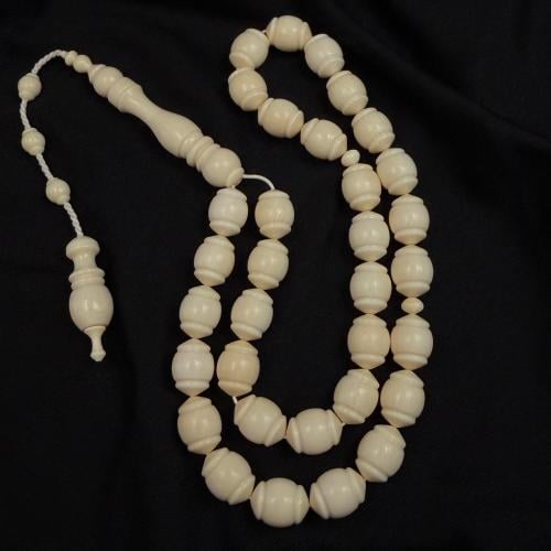 The ivory tusk of the elephant is natural.. the story of the queen.. weight (45) grams.. (33) beads.
