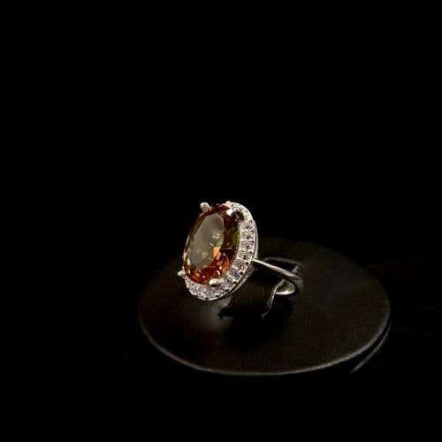 Color-changing Sultanite decorated with zircon.. 9...