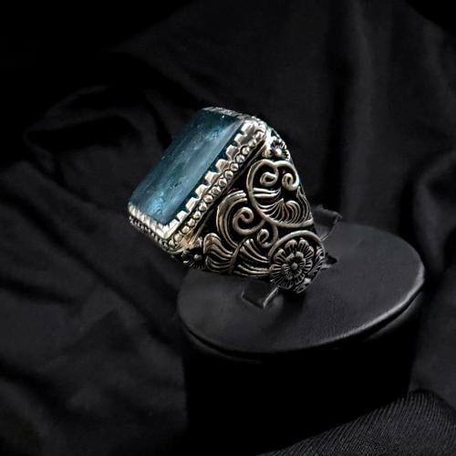 Obsidian volcanic color aquamarine craftsmanship Aware.. silver 990.. size (US 10).. length of the stone (18).. width of the stone...