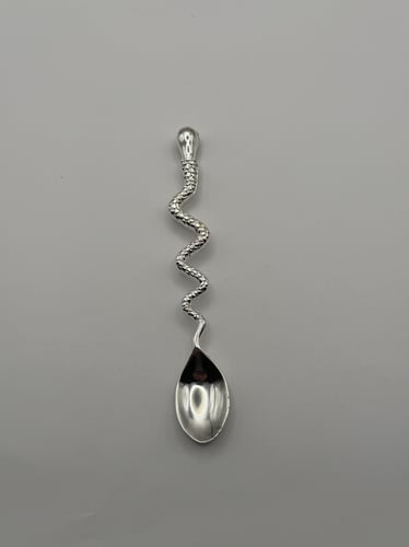 Silver snake-shaped vintage spoon