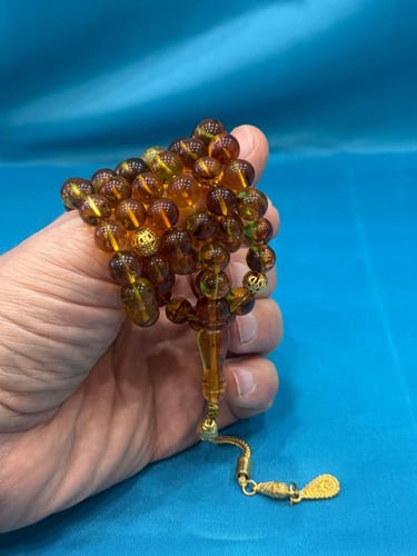 كهرمان عسلي محشر لعشاق السبح الحشرية