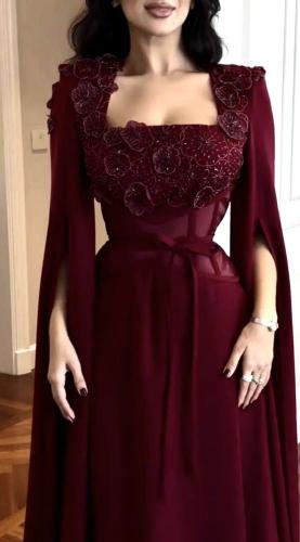 فستان بتصميم الكورسيه وصدريه مطرزه بالورد والخرز