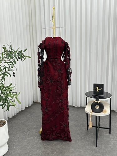 فستان سهرة بلون العودي مع كلفة موردة فااخرة وأكمام...