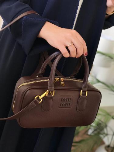 شنطه ميوميو بني