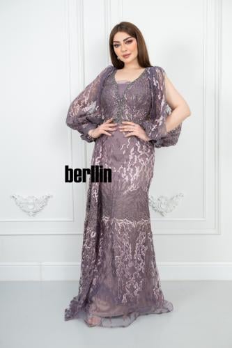 فستان سهرة أنيق بتصميم يتميز بتطريز فاخر مع أكمام...