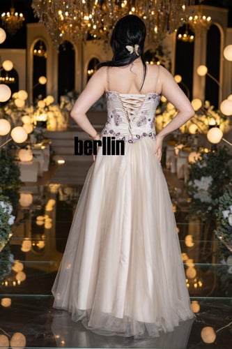 فستان سهرة كورسيه بتطريز موف وزهور مع تنورة تول مل...