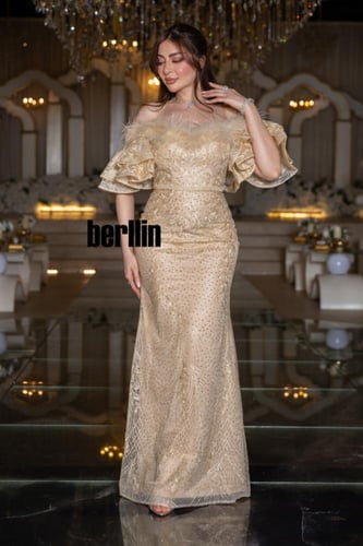 فستان سهرة شامبانيا رفرفة الذهب بريش فاخر وتطريز ك...