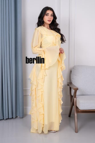 فستان ماكسي بتفاصيل كشكش وبكم حبال كلوش لون اصفر