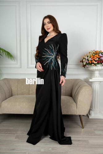 فستان سهرة سواريه بأكمام طويلة خرز لون اسود