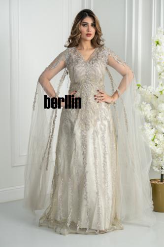 فستان سهرة ذهبي مطرز بالكامل مع كاب تول شفاف يمنح...