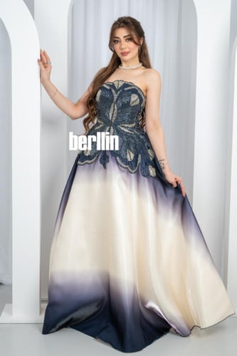 فستان سهرة الأومبري الكحلي والعاجي بتطريز أوراق لا...